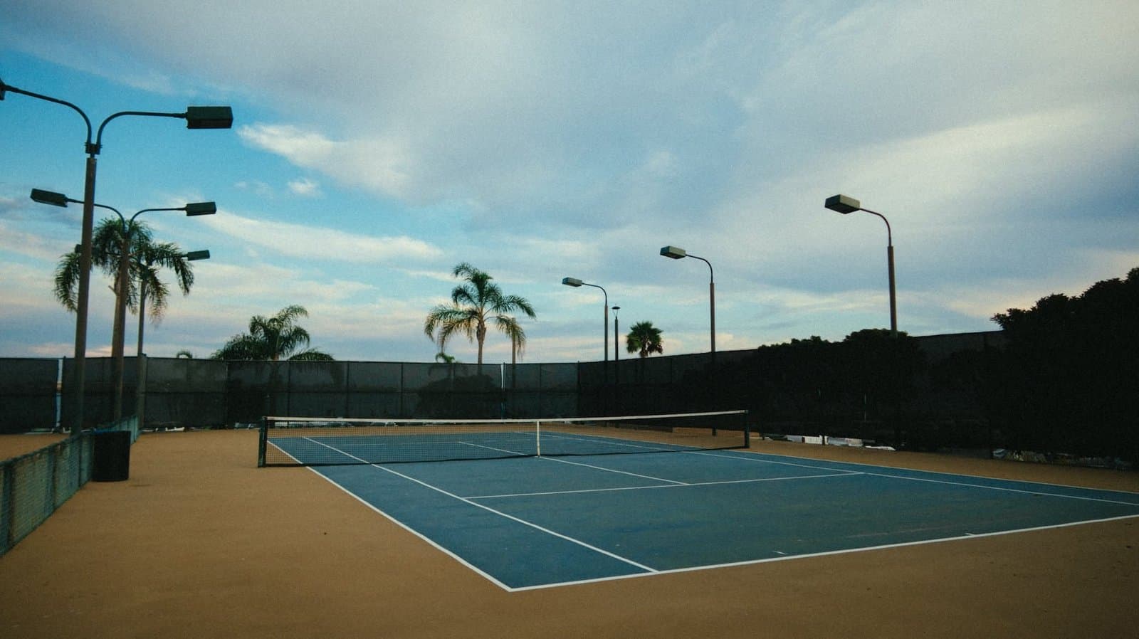 blue tennis court paid with HOA dues