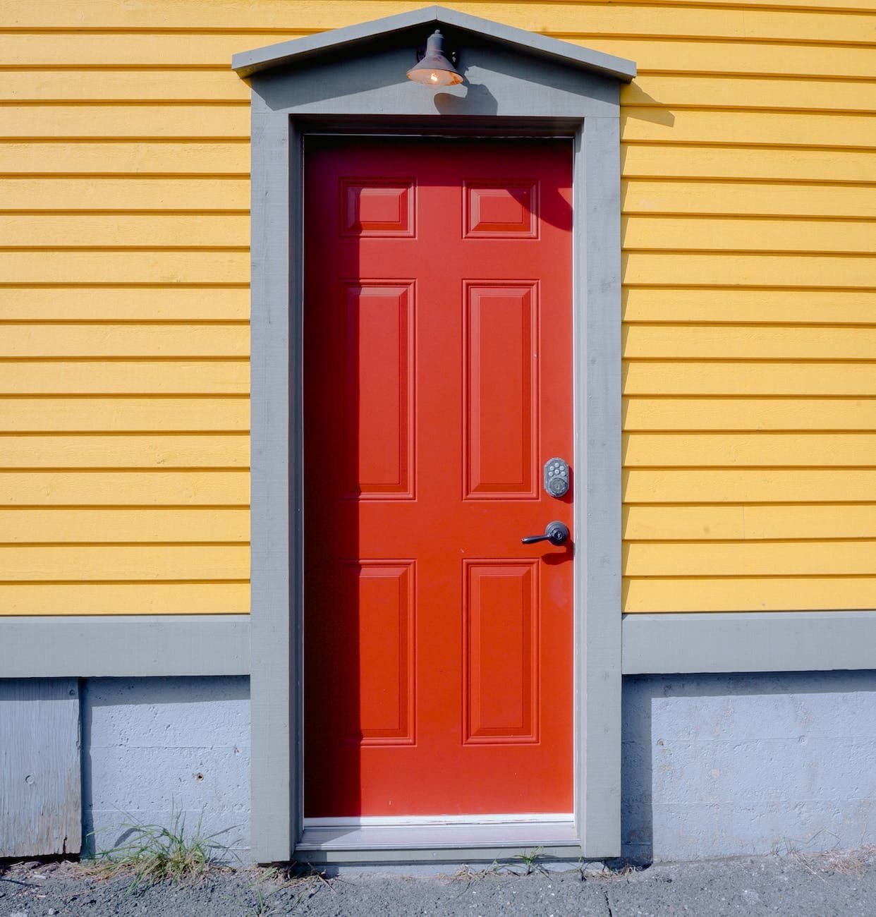 closed red wooden door to tenant portal tampa